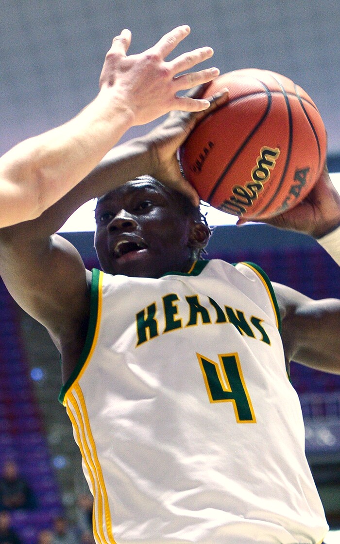 (Leah Hogsten  |  The Salt Lake Tribune) Kearns' Emmanuel Andrew (04) battles Weber's Braedon Iverson (05). Weber defeated Kearns 60-52 in the 6A High School Boys' Basketball Tournament opening game at Weber State University’s Dee Events Center in Ogden, Tuesday, Feb. 27, 2018. 