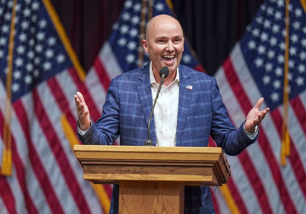 (Leah Hogsten | The Salt Lake Tribune) Utah Gov. Spencer Cox addresses delegates at the Utah Republican Party 2023 Organizing Convention at Utah Valley University's UCCU Center on Saturday, April 22, 2023.