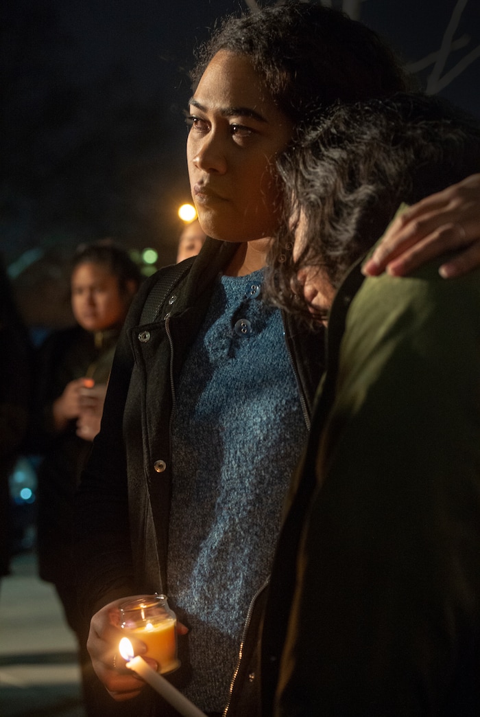 (Rick Egan  |  The Salt Lake Tribune)  Chelsea Lautaha hugs Fane Sleight, during a candlelight vigil on BYU campus, for the student who died by suicide this week, at the Tanner Building, Friday, Dec. 7, 2018.