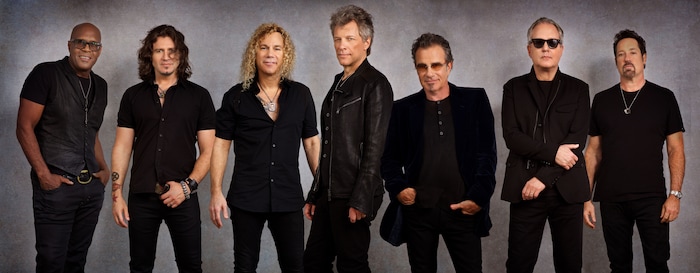 (Photo courtesy of David Bergman) The touring lineup of rock band Bon Jovi now features (from left): percussionist Everett Bradley, guitarist Phil X, keyboardist David Bryan, vocalist Jon Bon Jovi, drummer Tico Torres, bassist Hugh McDonald, and guitarist John Shanks.