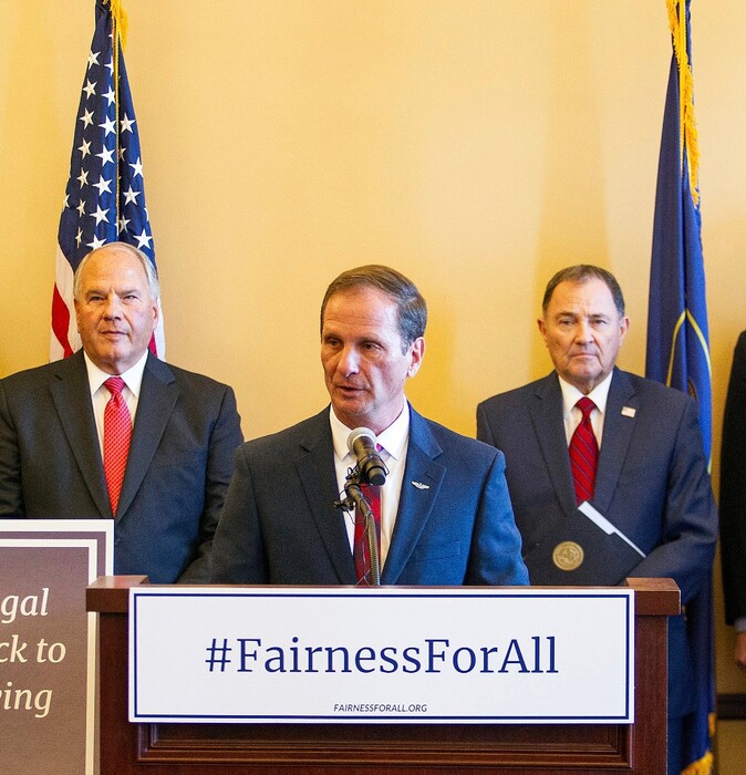 (Photo courtesy of Rep. Chris Stewart) Rep. Chris Stewart, R-Utah, is flanked by Church of Jesus Christ of Latter-day Saints Apostle Elder Ronald A. Rasband, left, and Utah Gov. Gary Herbert.