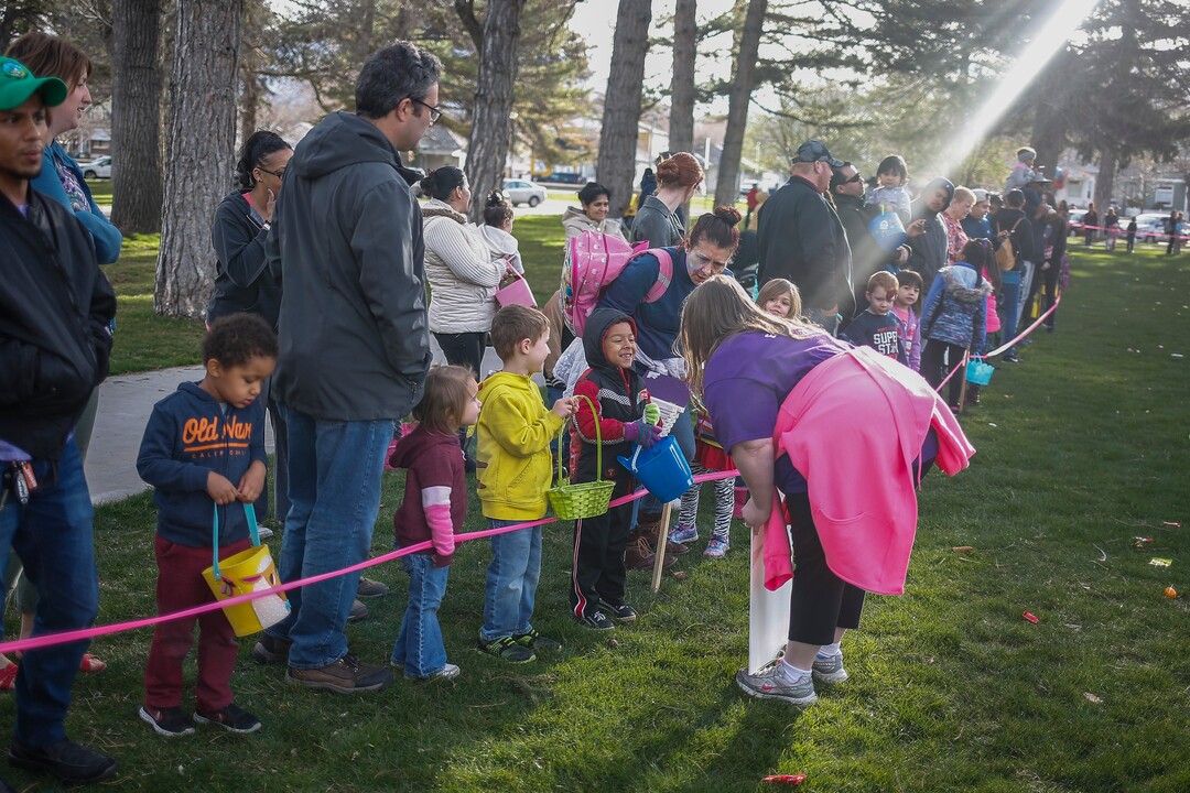 (Nicole Boliaux  |  For The Tribune)  Children and their families wait for the stroke of 9 o'clock to begin the annual Easter egg hunt put on by A Kid's Place Dentistry in Liberty Park in Salt Lake City on Saturday, March 31, 2018.