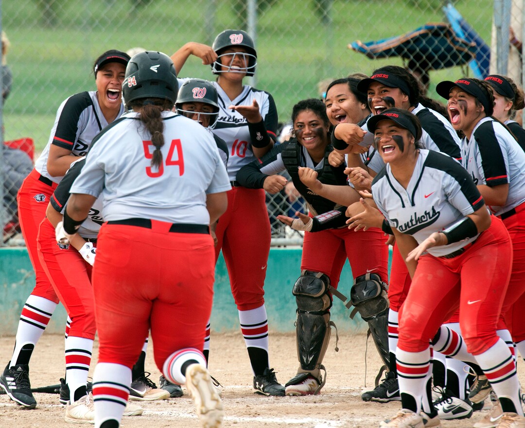 (Rick Egan  |  The Salt Lake Tribune)     West high celebrates as short stop Huntyr Ava crosses home plate after hitting a home run for the Panthers, in the first to two games against the Bountiful Braves, in the 5A state championship game in Taylorsville, Thursday May 30, 2019
