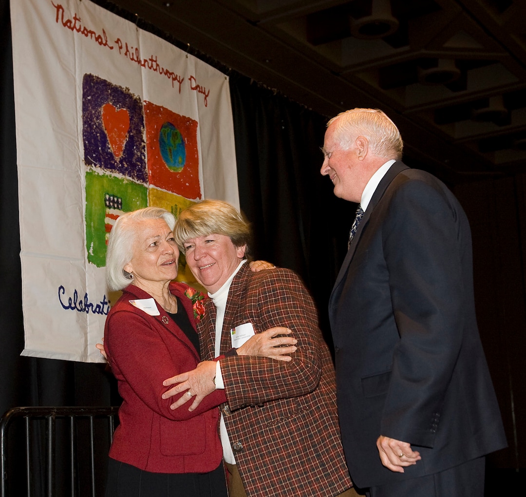 (Al Hartmann  |  Tribune file photo) Honorary Chair, Norma Matheson, left, congratulates Karen and Alan Ashton as they accept the Philanthropic Leadership Award at the Salt Palace Ballroom in 2007.