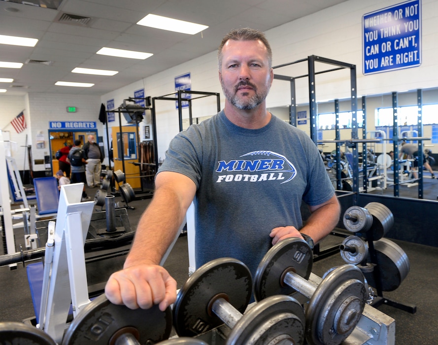 Al Hartmann | The Salt Lake Tribune
Dave Peck, Bingham football coach, works out in the high school's weight room. He has been the state's top high school football coach the past few years.