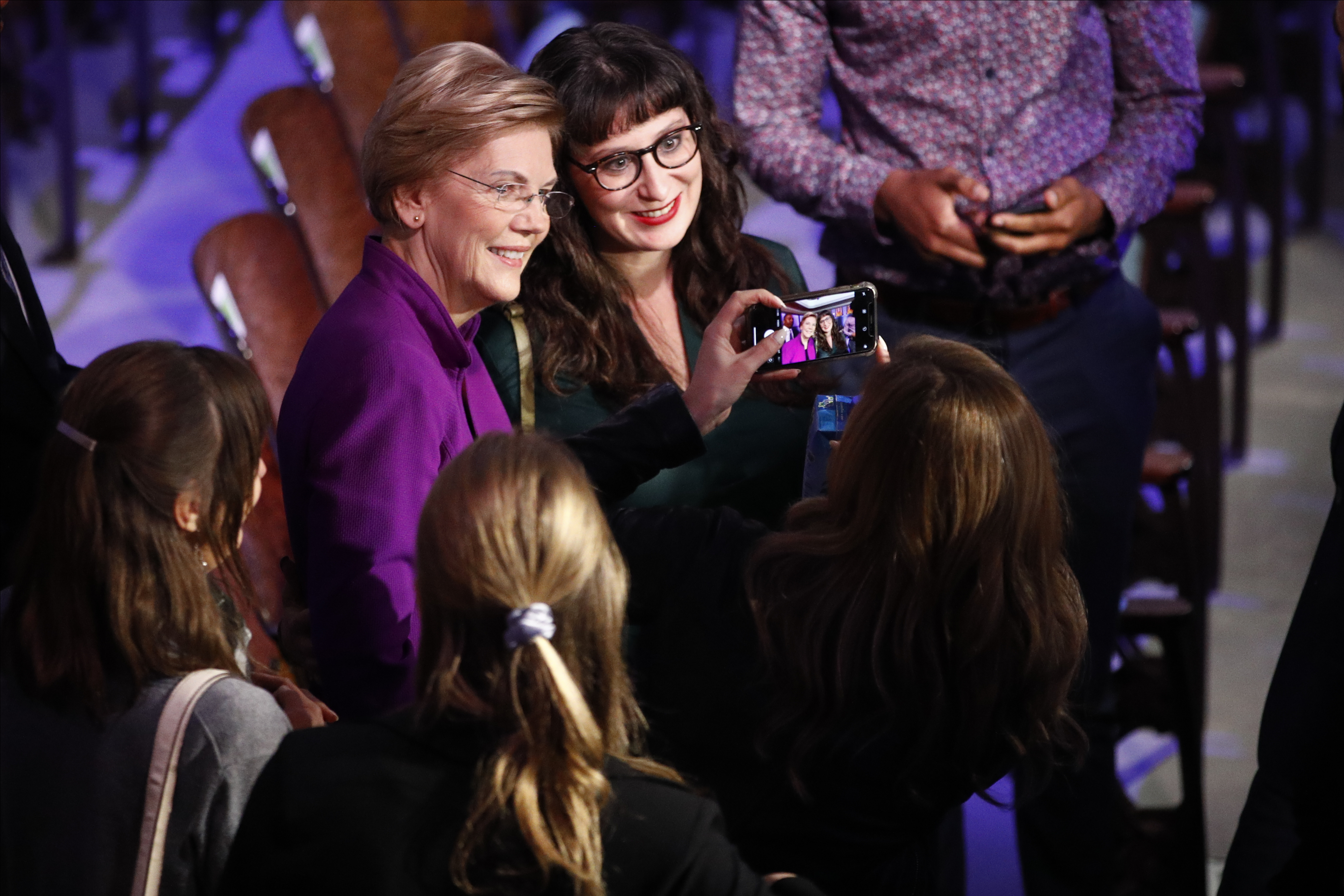 (Patrick Semansky | AP) Democratic presidential candidate Sen. Elizabeth Warren, D-Mass., pauses for a photo Tuesday, Jan. 14, 2020, after a Democratic presidential primary debate hosted by CNN and the Des Moines Register in Des Moines, Iowa.
