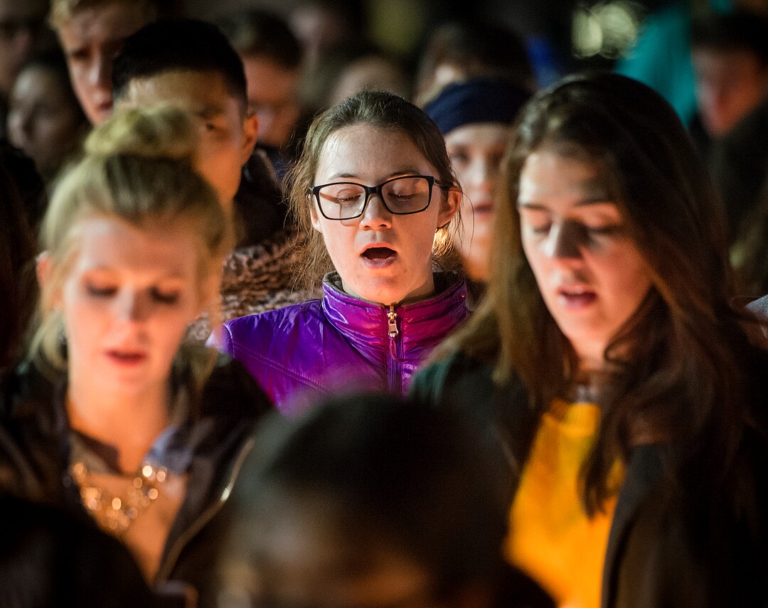 Michael Mangum  |  Special to the TribuneCarolina Herdegen, center, a senior at BYU, and other students sing hymns during a candlelight vigil held outside the N. Eldon Tanner Building on the campus of BYU in Provo, UT on Wednesday, December 5th, 2018.