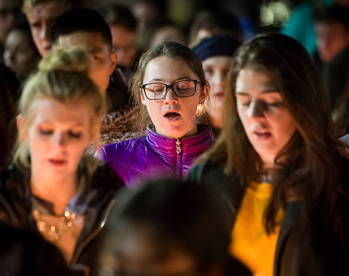 Michael Mangum  |  Special to the Tribune

Carolina Herdegen, center, a senior at BYU, and other students sing hymns during a candlelight vigil held outside the N. Eldon Tanner Building on the campus of BYU in Provo, UT on Wednesday, December 5th, 2018.