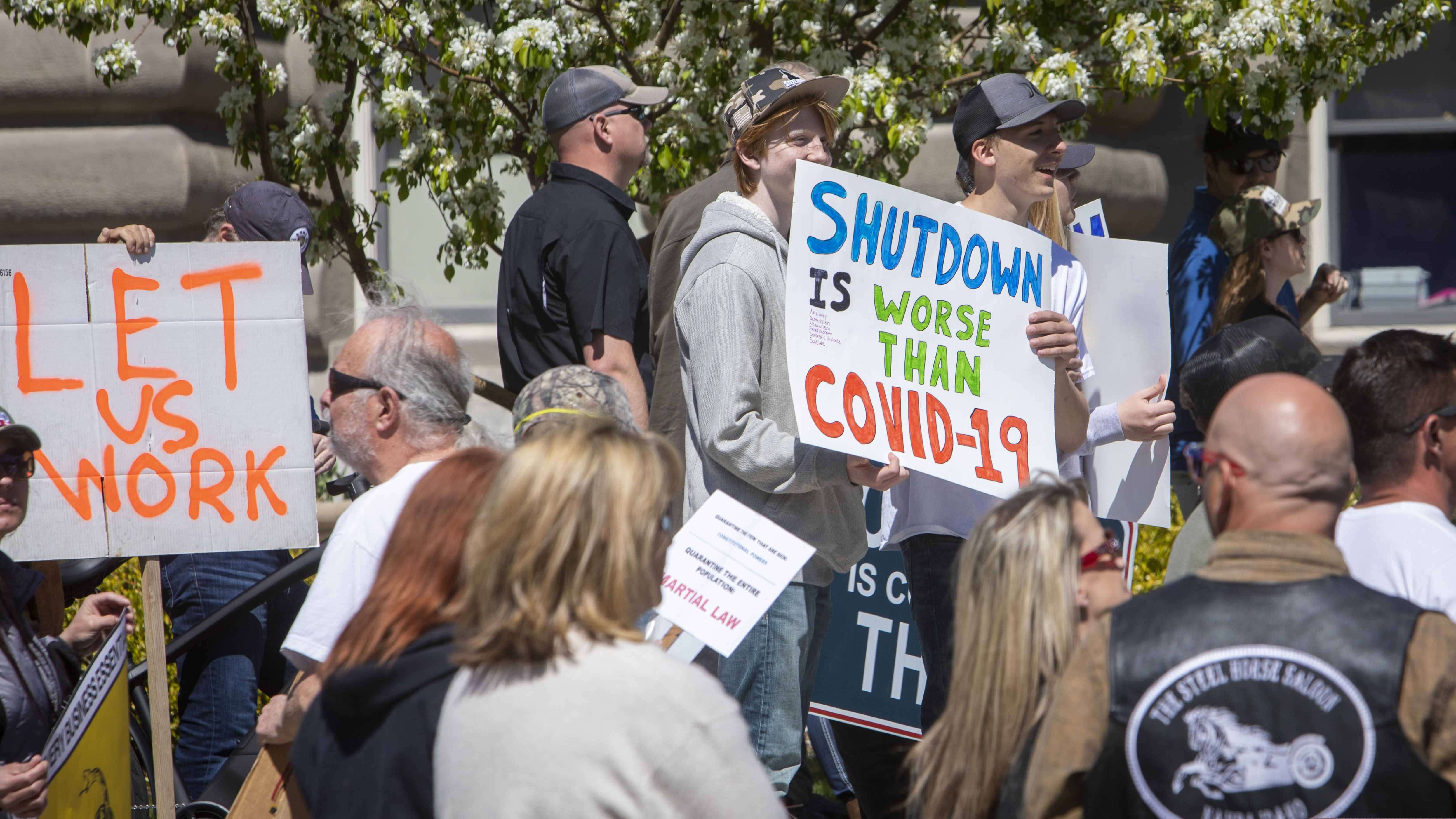 (Katherine Jones | Idaho Statesman via AP) Several hundred people attended a "Stand for Freedom" protest at the Capitol, protesting — and in violation of — Idaho Gov. Brad Little's stand-home order during the coronavirus pandemic in Boise, Idaho, Friday, April 17, 2020.