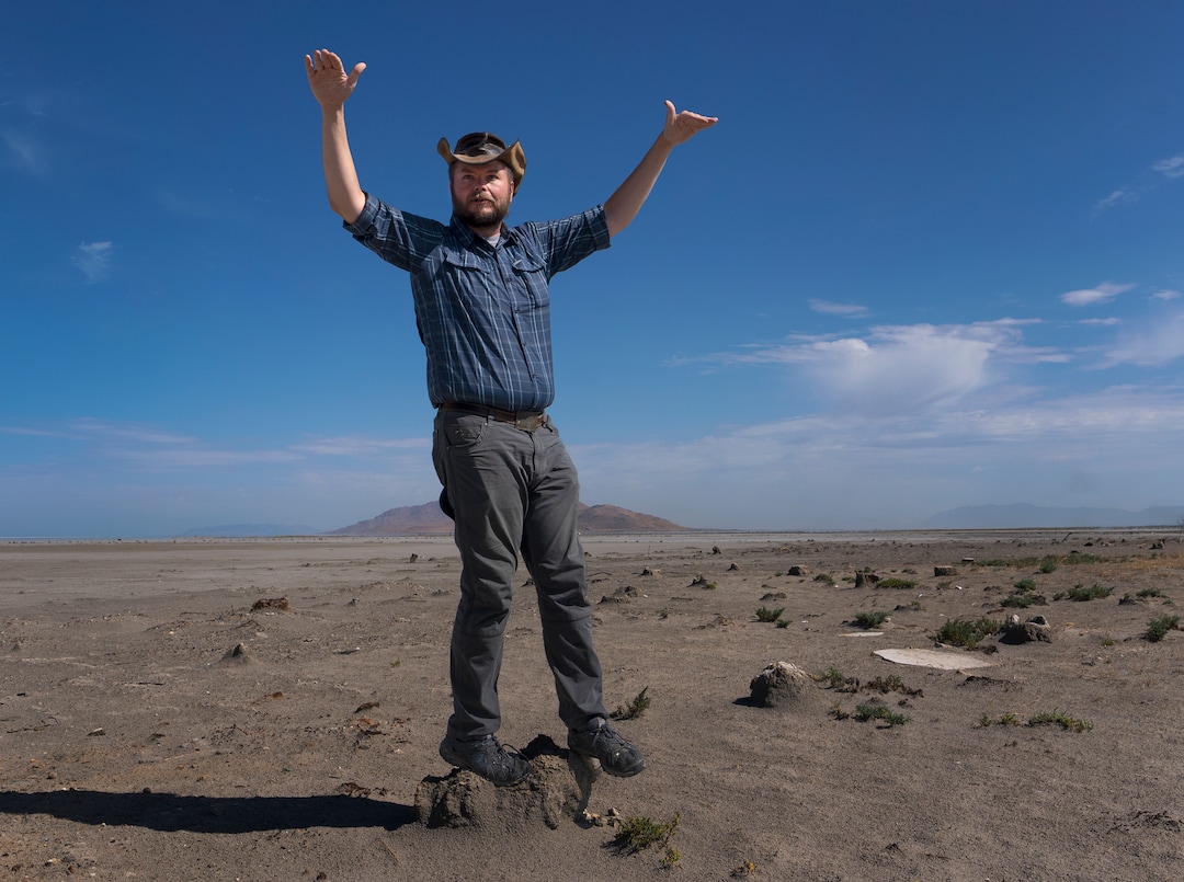 (Leah Hogsten | The Salt Lake Tribune) Christopher Merritt, a state historic preservation officer, stands on the stumps that would have held up the platforms of the two former Saltair pavillions, Thursday, July 21, 2022. 