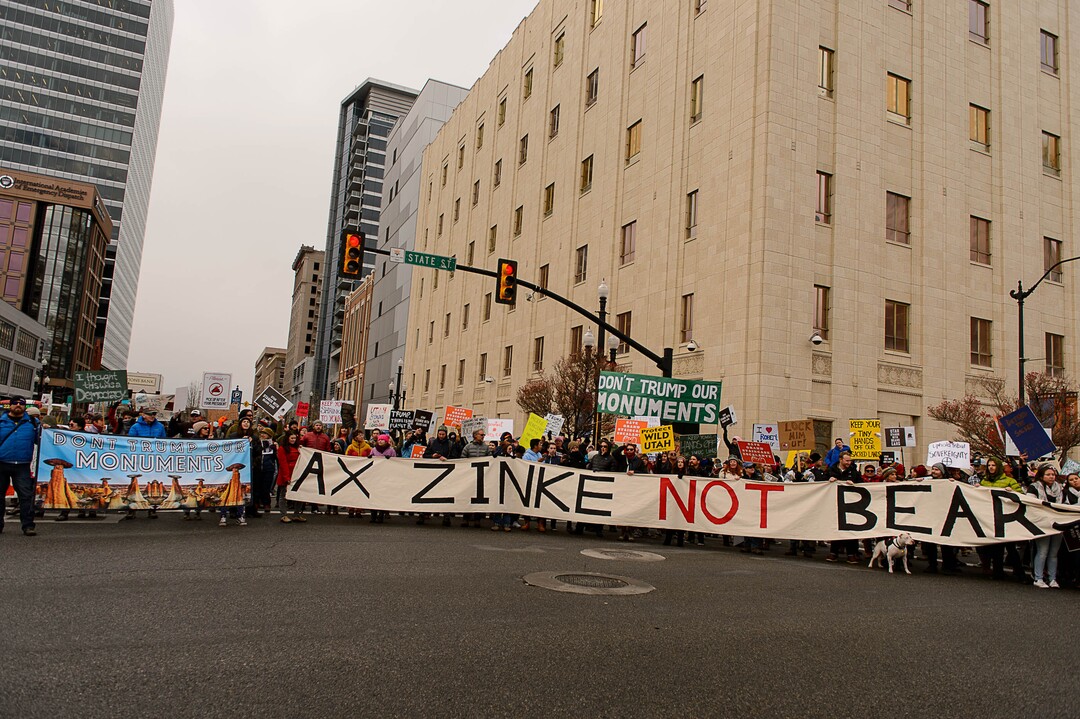 (Trent Nelson | The Salt Lake Tribune)  Protesters block off an intersection downtown after a rally against a visit by President Donald Trump, Monday December 4, 2017.