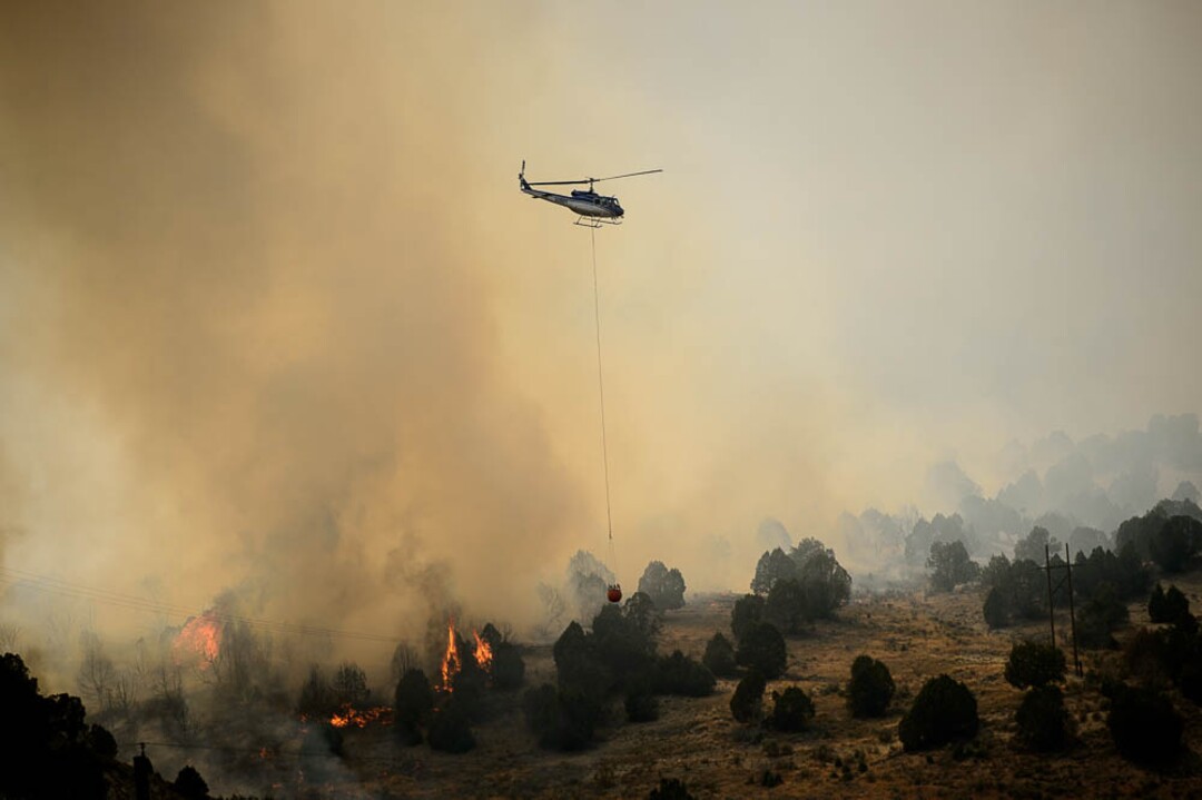 (Trent Nelson | The Salt Lake Tribune) The Coal Hollow Fire burns along Highway 6 in Utah County, Thursday Aug. 9, 2018.