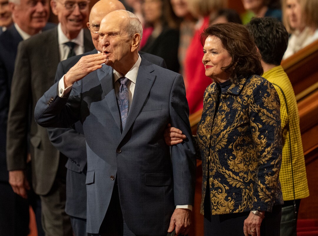 (Rick Egan | The Salt Lake Tribune) President Russel M. Nelson blows a kiss to the audience with his wife, Wendy, after the women's session of LDS General Conference on Saturday, April 2, 2022.
