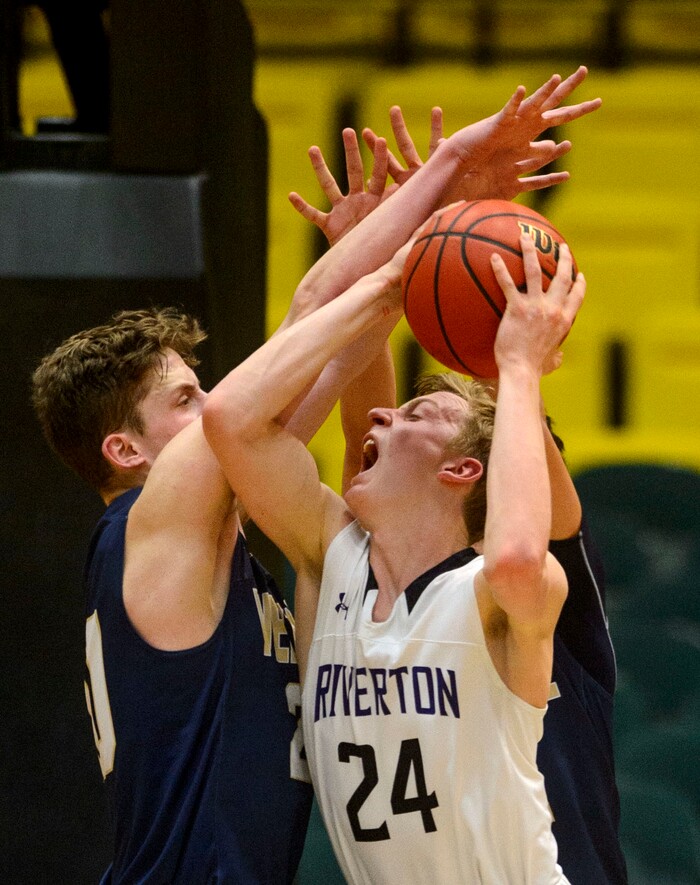 (Steve Griffin | The Salt Lake Tribune) Riverton's Richard Saunders battles the Westlake defense during 6A basketball playoff game at the Utah Valley UniversityÕs UCCU Center in Provo Tuesday Feb. 27, 2018.