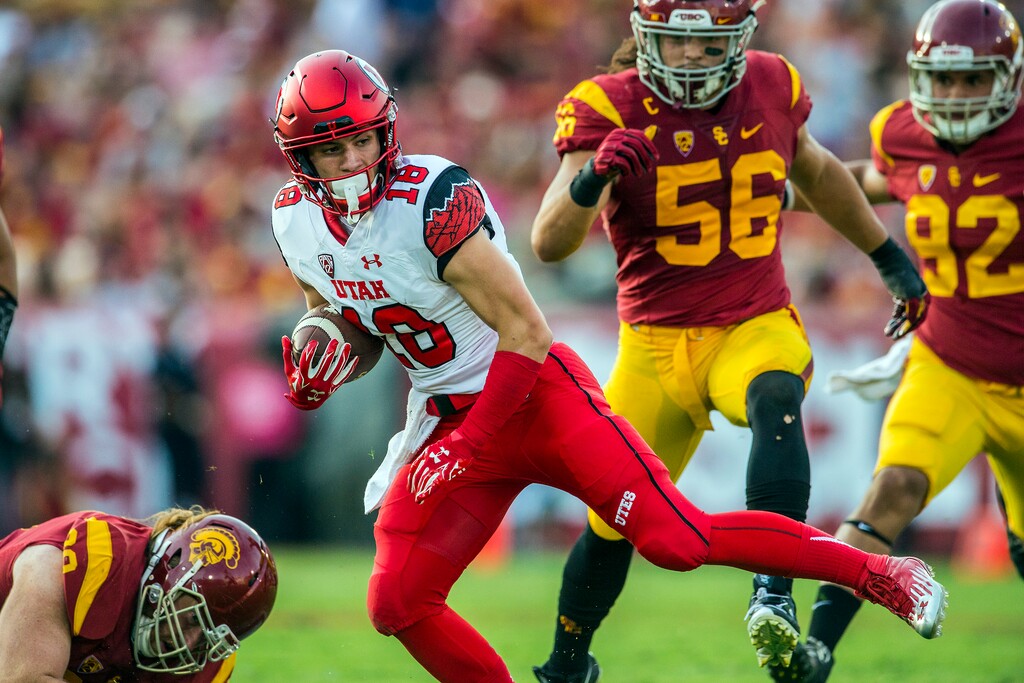 Chris Detrick | The Salt Lake Tribune
Utah Utes wide receiver Britain Covey (18) runs past USC Trojans linebacker Anthony Sarao (56) and USC Trojans tight end Tyler Petite (82) during the game at the Los Angeles Memorial Coliseum Saturday October 24, 2015.