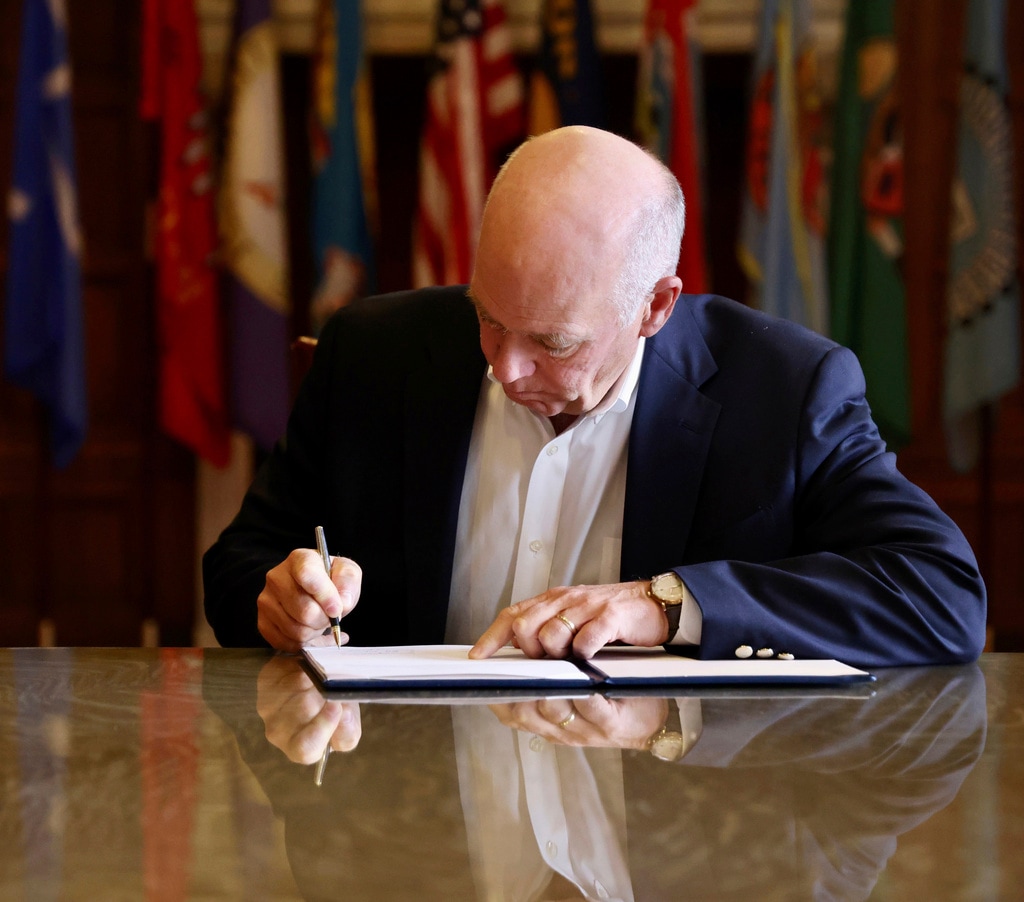 (Garrett Turner | Montana Governor's Office via AP) In this photo provided by the Montana Governor's Office, Republican Gov. Greg Gianforte signs a law banning TikTok in the state, Wednesday, May 17, 2023, in Helena, Mont. That law made Montana became the first state in the U.S. to completely ban TikTok.