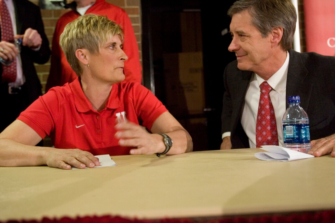(Tribune File Photo)  University of Utah women's basketball coach Elaine Elliott, left, talks with director of athletics Dr. Chris Hill after a press conference Wednesday, March 31, 2010 at Huntsman Center on the campus of the University of Utah in Salt Lake City. Coach Elliott announced she will take a one year leave of absence while she considers retirement.