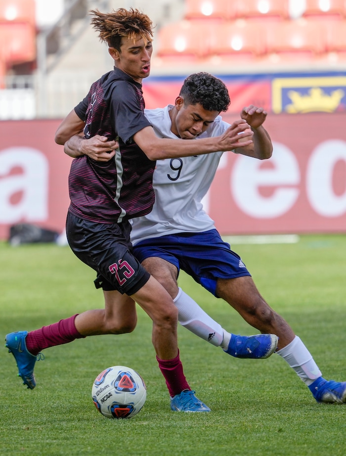 (Leah Hogsten | The Salt Lake Tribune) Layton's Joao Gallo battles Real's Jesus Cruz as Real Salt Lake Academy meets Layton Christian Academy for the 3A State Soccer Championship title at Rio Tinto Stadium, Wednesday, May 11, 2022. Layton Christian Academy won the title 4-0. 