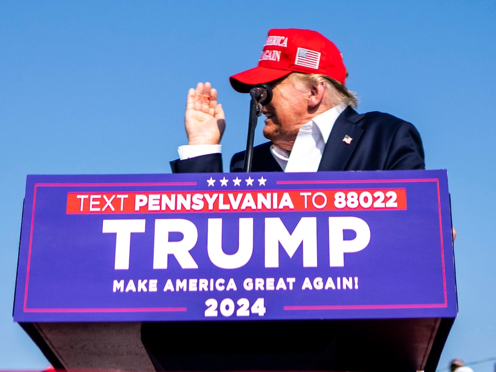 Former President Donald Trump inspects his hand after touching his ear, as he speaks at a campaign rally in Butler, Pa, on Saturday, July, 13, 2024.  (Doug Mills/The New York Times)