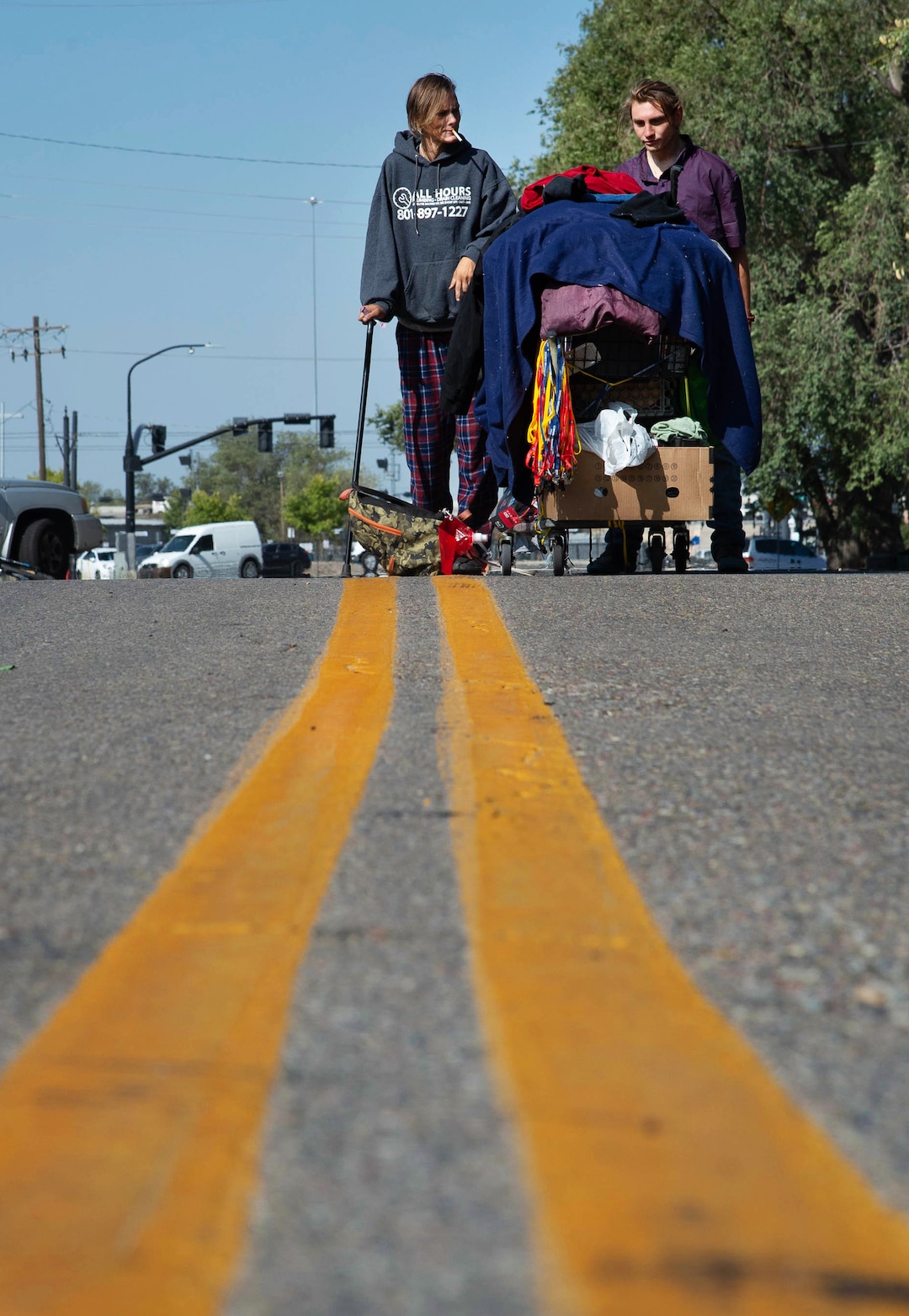 (Francisco Kjolseth  |  The Salt Lake Tribune) People prepare themselves for plans by the Salt Lake County Health Department to clean up homeless camps on Thursday, Sept. 10, 2020, as they gather their belongings near the former Road Home Shelter.