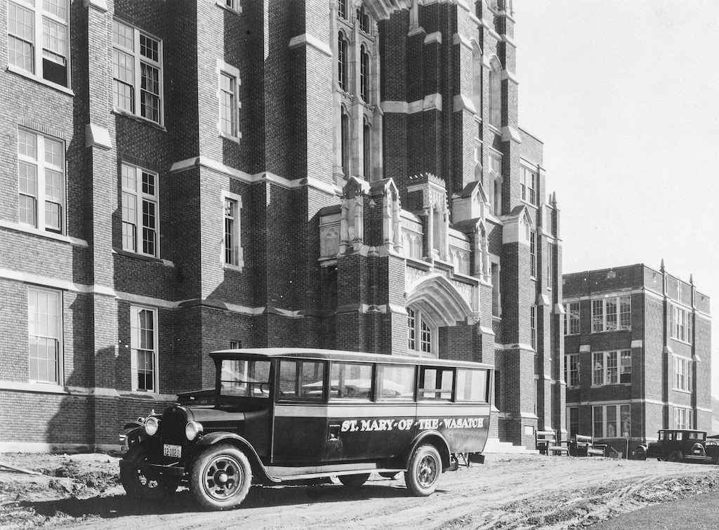 (Sisters of the Holy Cross) Catholics developed an extensive network of schools in Utah. Here a bus waits outside the College of St. Mary of the Wasatch near 1300 South and 3000 East, which stood on 400 acres of barren land.