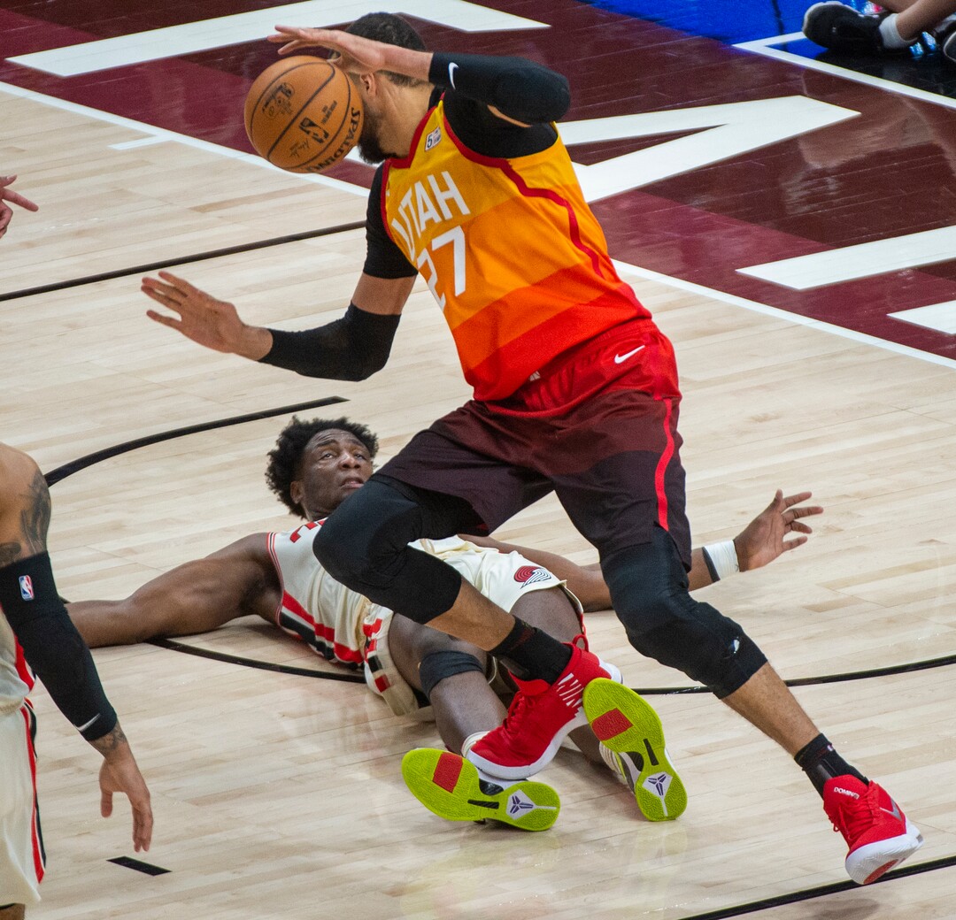 (Rick Egan  |  The Salt Lake Tribune)     Portland Trail Blazers forward Caleb Swanigan (50) draws a foul as he collides with Utah Jazz center Rudy Gobert (27), in the Jazz 117-114 win over the Portland Trail Blazers, in NBA action in Salt Lake City, Friday, Feb. 7, 2020.