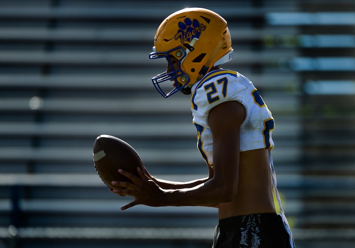 (Leah Hogsten | The Salt Lake Tribune) Orem High School football team quarterback, Micah Fe'A, August 8, 2019.