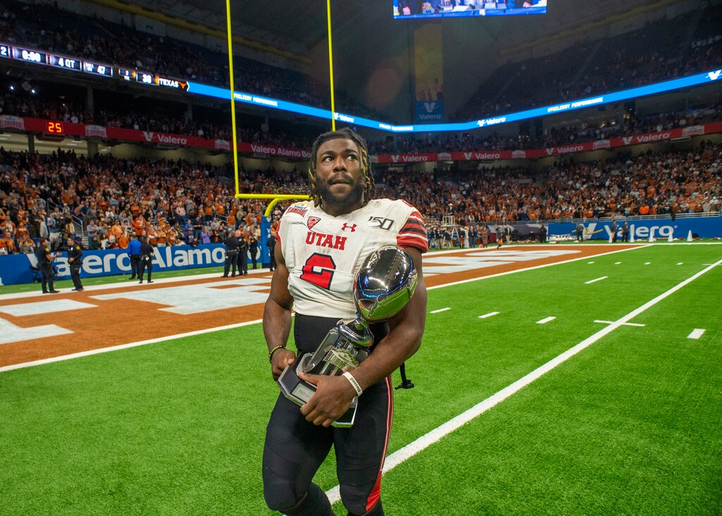 (Rick Egan  |  The Salt Lake Tribune) Utah Utes running back Zack Moss (2) leaves the field with the Sportsmanship Award following the Alamo Bowl between the Utes and the Texas Longhorns in San Antonio, Tuesday, Dec. 31, 2019.