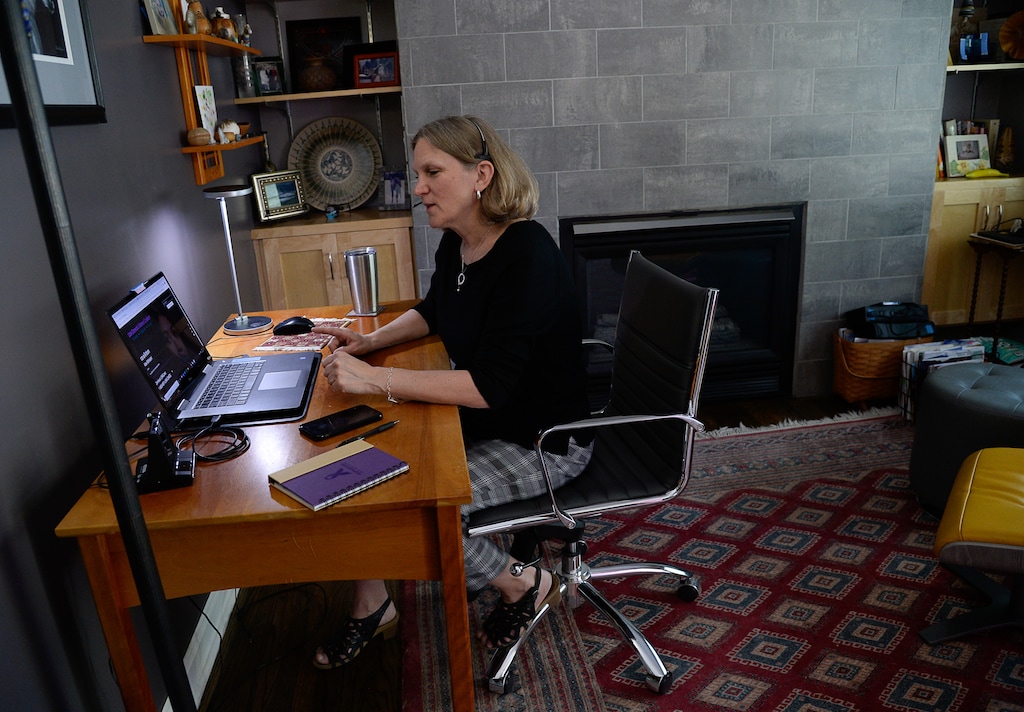 (Francisco Kjolseth  |  The Salt Lake Tribune) Lynn Fasciano works from home in Salt Lake City on Thursday, April 30, 2020, where she volunteers with her time answering the rising number of domestic calls in the state. 