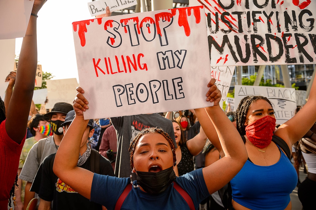 (Trent Nelson  |  The Salt Lake Tribune) Protesters in front of the Public Safety Building during a protest against police brutality in Salt Lake City on Monday, June 1, 2020.