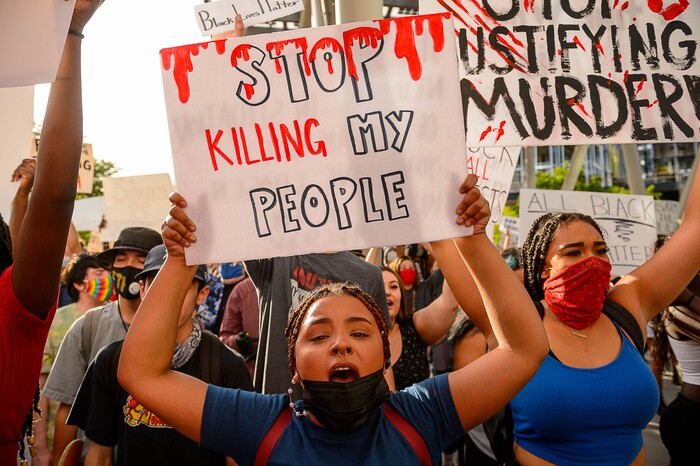 (Trent Nelson  |  The Salt Lake Tribune) Protesters in front of the Public Safety Building during a protest against police brutality in Salt Lake City on Monday, June 1, 2020.