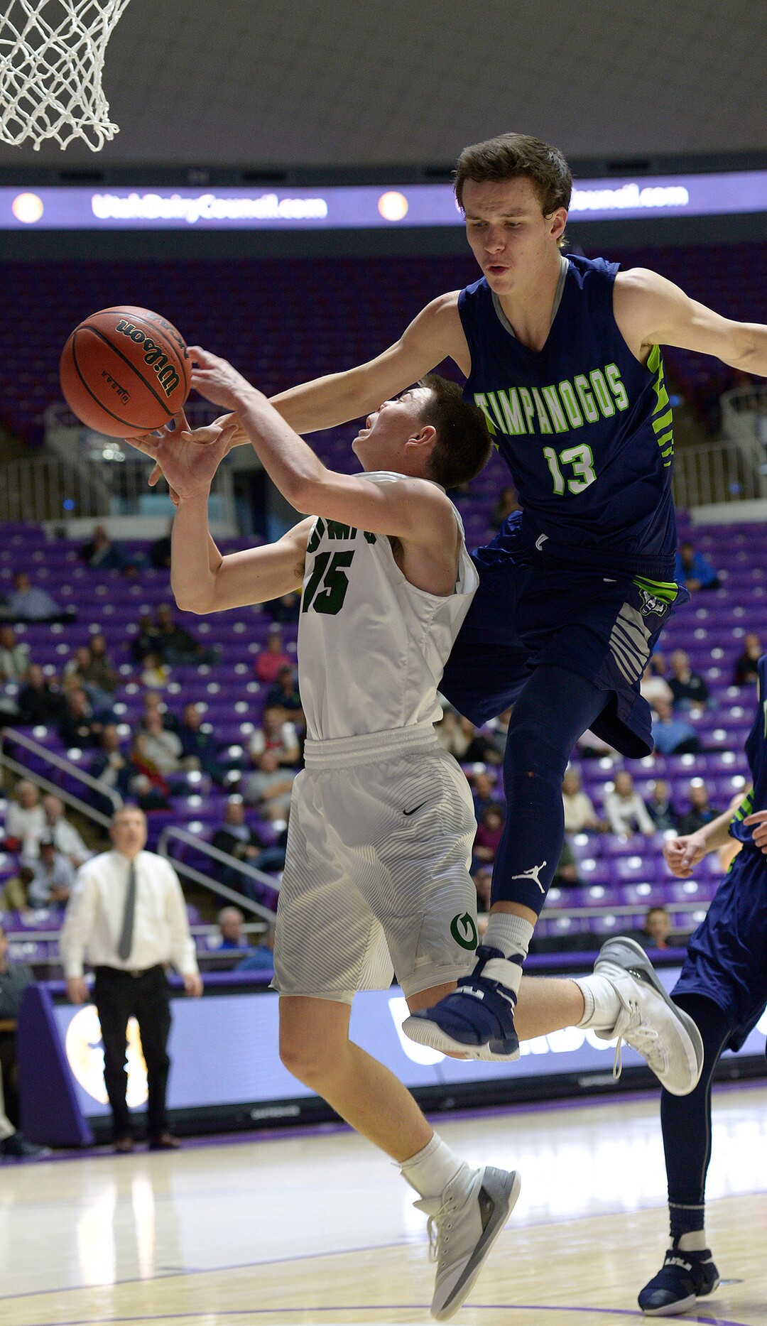 Leah Hogsten  |  The Salt Lake TribuneTimpanogos' Conner Halford fouls Olympus' Rylan Jones. Olympus High School defeated Timpanogos High School 91-69 during their 4A State boys’ basketball quarterfinal playoff game at Weber State University's Dee Events Center, Thursday, March 2, 2017.