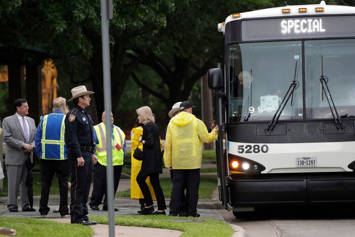 Guests arrive at St. Martin's Episcopal Church for a funeral service for former first lady Barbara Bush, Saturday, April 21, 2018, in Houston. (AP Photo/Evan Vucci)
