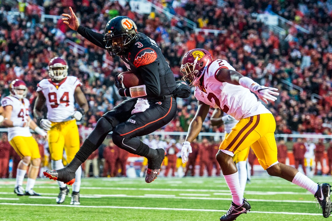 Chris Detrick  |  The Salt Lake TribuneUtah Utes quarterback Troy Williams (3) scores a touchdown past USC Trojans defensive back Adoree' Jackson (2) during the first half of the game at Rice-Eccles Stadium Friday September 23, 2016. 