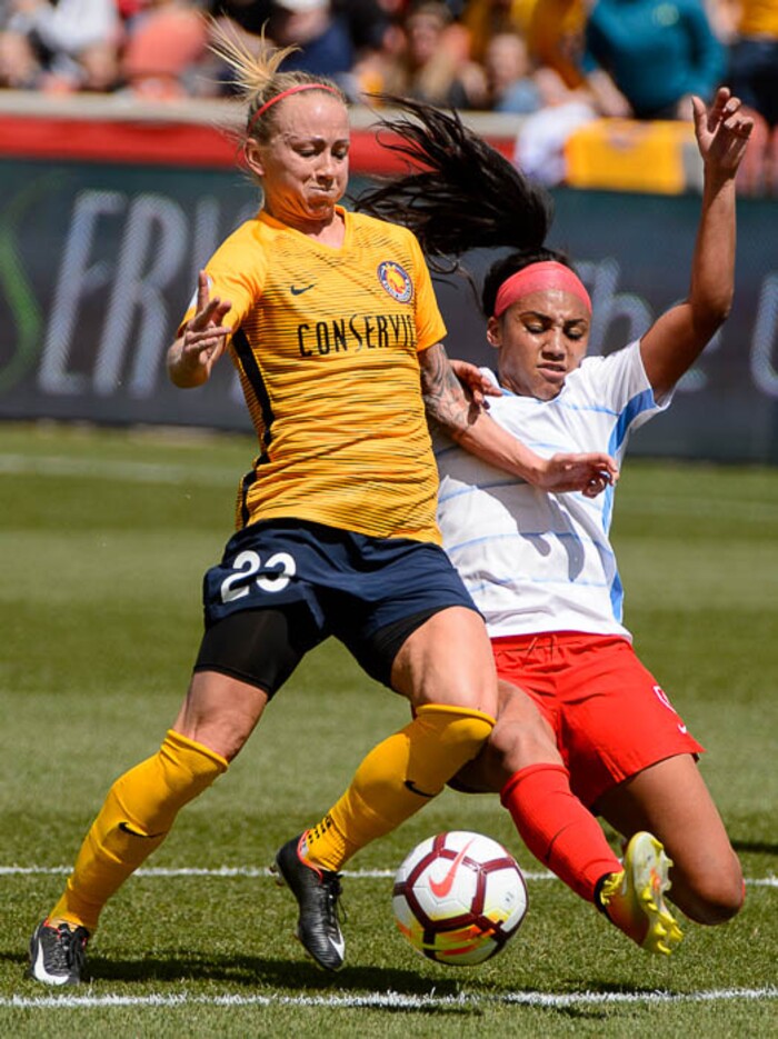 (Trent Nelson | The Salt Lake Tribune)  
Utah Royals FC hosts the Chicago Red Stars, at Rio Tinto Stadium in Sandy, Saturday April 14, 2018. Utah Royals FC midfielder Gunnhildur Jónsdóttir (23) is tripped up by Chicago Red Stars defender Samantha Johnson (16).