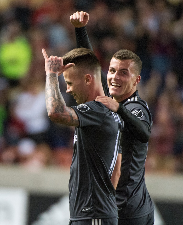(Rick Egan  |  The Salt Lake Tribune)     Real Salt Lake forward Brooks Lennon (12) celebrates the goal by Real Salt Lake midfielder Albert Rusnak (11) late in the game, in MLS soccer action, between Real Salt Lake and Colorado Rapids,  at Rio Tinto Stadium, Saturday, April 21, 2018.


