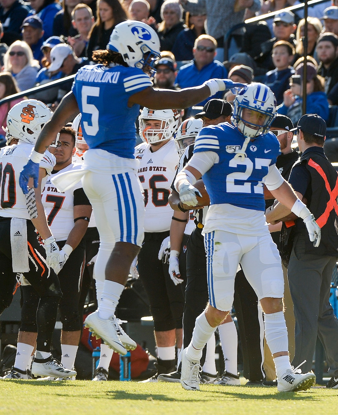 (Leah Hogsten  |  The Salt Lake Tribune) Brigham Young Cougars defensive back Dayan Ghanwoloku (5) celebrates Brigham Young Cougars defensive back Beau Tanner (27) after he block a pass intended for Idaho State Bengals wide receiver Michael Dean (20) as Brigham Young University takes on Idaho State, Saturday, Nov. 16, 2019 at LaVell Edwards Stadium.