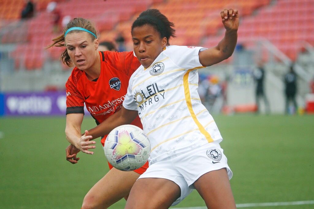 (Rick Bowmer | AP) Utah Royals FC defender Elizabeth Ball, right, battles with Houston Dash forward Veronica Latsko for the ball during the first half of an NWSL Challenge Cup soccer match at Zions Bank Stadium Tuesday, June 30, 2020, in Herriman.