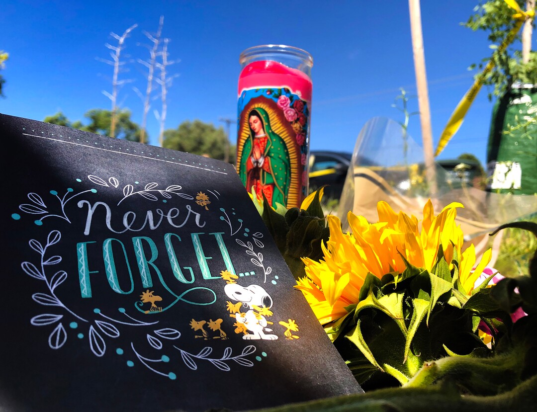 (Rick Egan  |  The Salt Lake Tribune)     A memorial for MacKenzie Leuck, on the sidewalk next to the Fairpark home on 1000 West, that the police have been searching, Friday, June 28, 2019.
