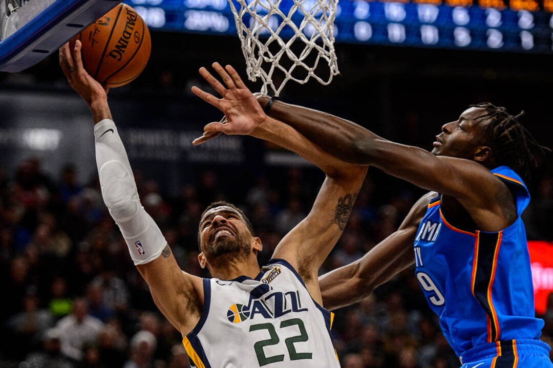 (Trent Nelson | The Salt Lake Tribune)  Utah Jazz forward Thabo Sefolosha (22) defended by Oklahoma City Thunder forward Jerami Grant (9) as the Utah Jazz host the Oklahoma City Thunder, NBA basketball in Salt Lake City, Saturday December 23, 2017.