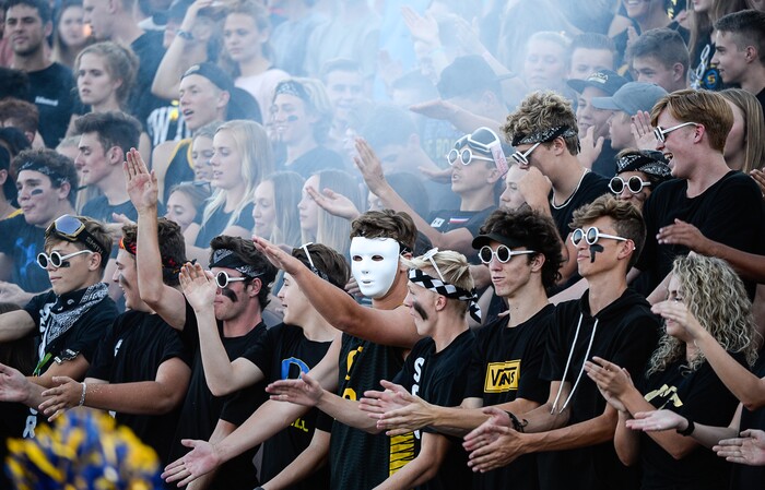 (Francisco Kjolseth  |  The Salt Lake Tribune)  The Orem fans cheer on their team as they host Bingham for the start of the football season, Thursday, Aug. 16, 2018.