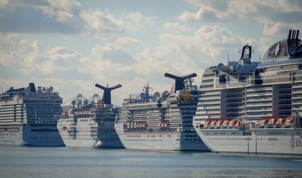 (Angel Valentin | The New York Times) Cruise ships docked at the Port of Miami on Saturday, April 4, 2020. The White House has blocked a new order from the Centers for Disease Control and Prevention to keep cruise ships docked until mid-February, a step that would have displeased the politically powerful tourism industry in the crucial swing state of Florida.