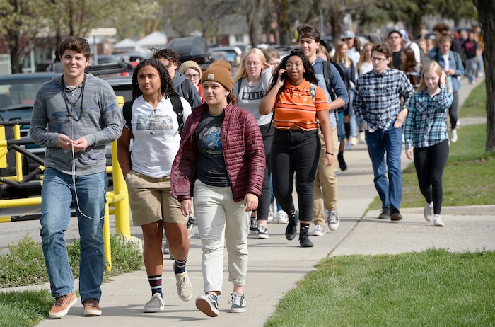 (Al Hartmann  |  The Salt Lake Tribune) 	
Over one hundred students at Highland High School staged a walkout Friday April 20, 2018 in honor of the anniversary of the Columbine High School massacre. Demonstrators walked from the school to Sugar House Park where they made posters, wrote letters to their congressmen and listened to speakers. 