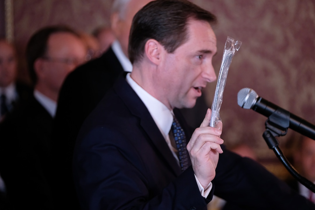 (Francisco Kjolseth  |  The Salt Lake Tribune)  Rep. Steve Eliason, R-Sandy, holds up a gun lock as he describes the number one preventer of suicide as the suicide task force presents its first report at the Utah Capitol on Tuesday, Feb. 20, 2018.  