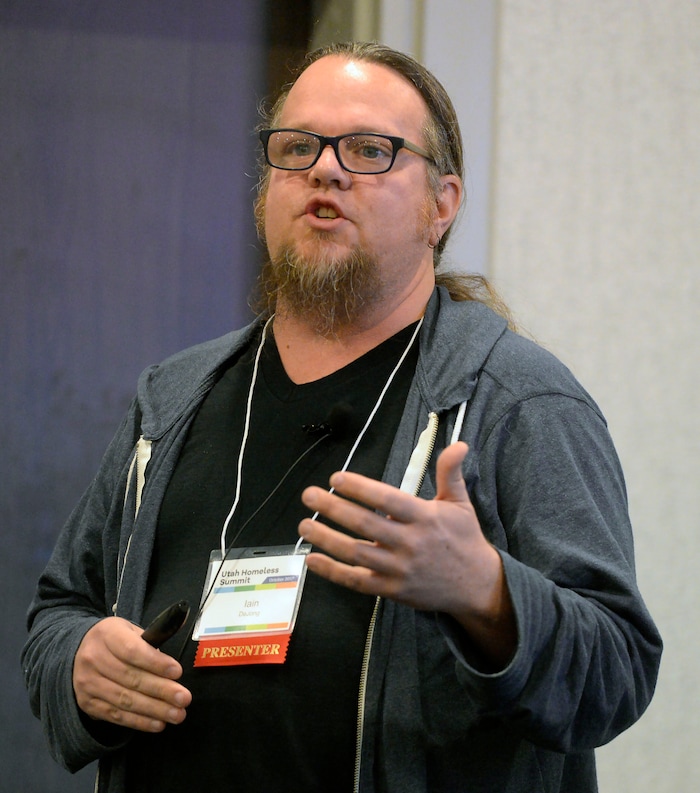 (Al Hartmann  |  The Salt Lake Tribune) 	
Homelessness advocate, educator, Iain De Jong speaks at a breakout session to Utah homeless service providers at Utah's 14th Annual Homelessness Summit in Salt Lake City Wednesday Oct. 11.  He spoke on housing-focused services in shealter and when to encourage self resolution.  