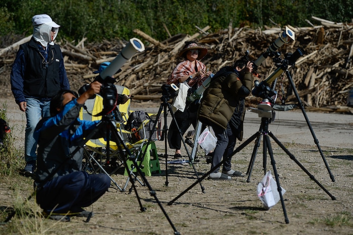 (Francisco Kjolseth  |  The Salt Lake Tribune)  People gather at the edge of Palisades Reservoir, Idaho, to experience the total eclipse of the sun on Monday, August 21, 2017.
