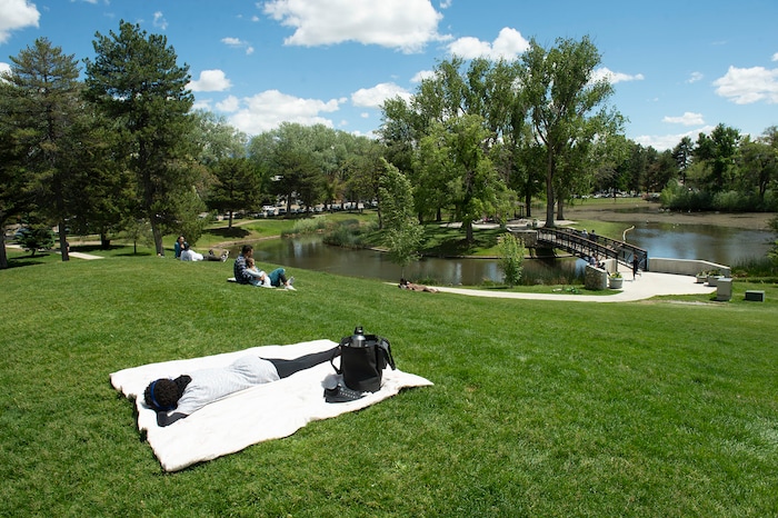 (Rick Egan  |  The Salt Lake Tribune)      Visitors enjoy a sunny afternoon at Liberty Park, Saturday, May 23, 2020.