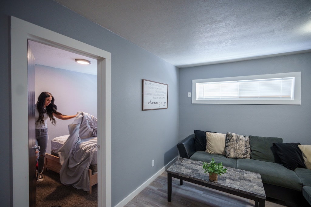 (Trent Nelson  |  The Salt Lake Tribune) Shinia Allred cleans a home that she and her husband McKoy rent on Airbnb, in Castle Dale in Emery County, on Monday, Aug. 8, 2022.
