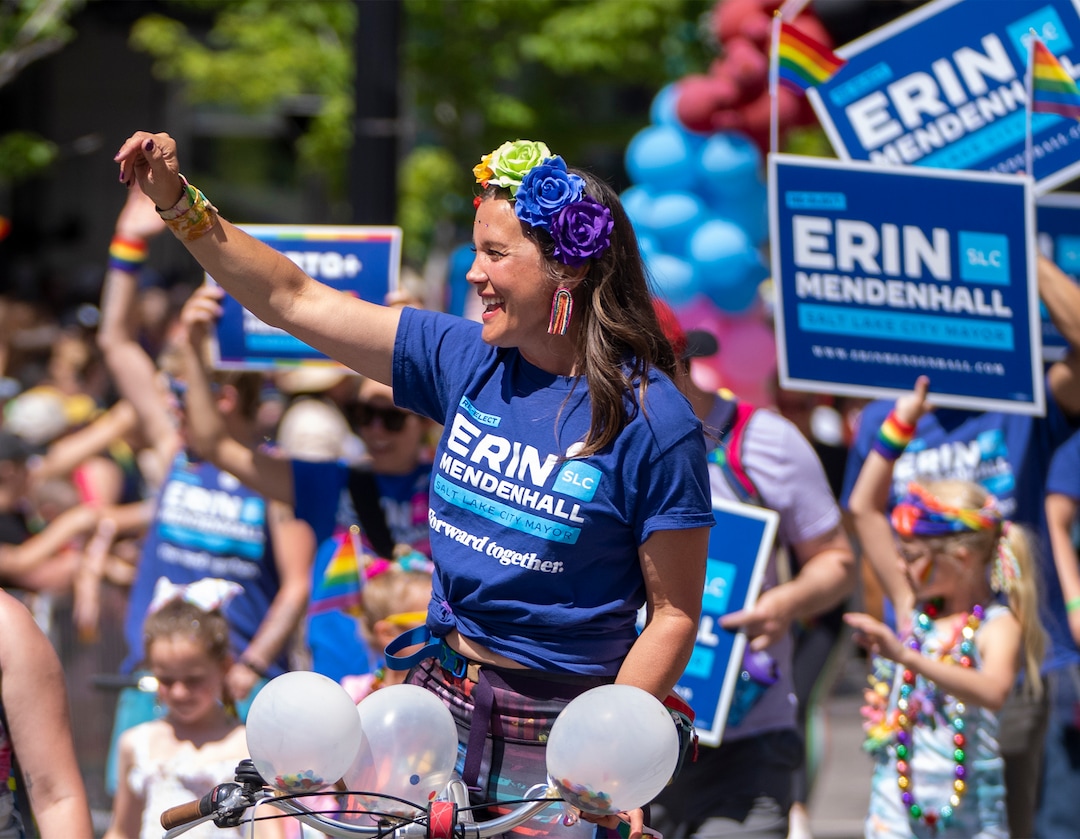 (Rick Egan | The Salt Lake Tribune)  Salt Lake City Mayor Erin Mendenhall rides her bike, in the Pride Parade, on Sunday, June 4, 2023.