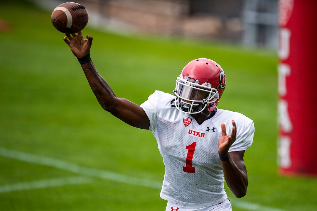 (Chris Detrick  |  The Salt Lake Tribune) Utah Utes quarterback Tyler Huntley (1) throws the ball during practice Tuesday, August 22, 2017. 
